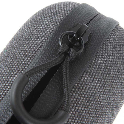 Close-up angled view of the textured gray fabric and black zipper pull on the RYOT Hardcase.