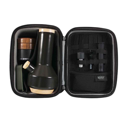 Open case view of the RYOT Safe Case showing a matte black and wood-accented water pipe on the left and organized tool straps on the right.