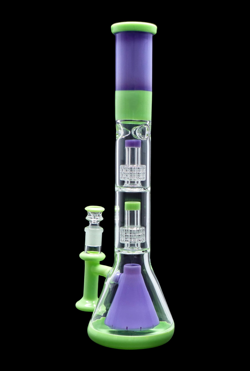 A vibrant green and purple glass bong with multiple filtration chambers and a separate glass bowl.