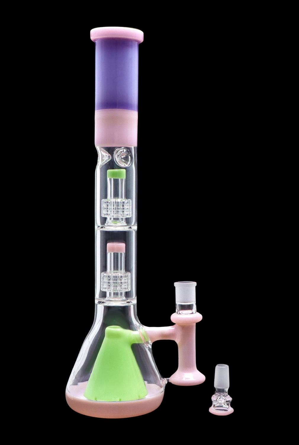 Pink and green glass bong with percolators, accompanied by a slide and bowl.