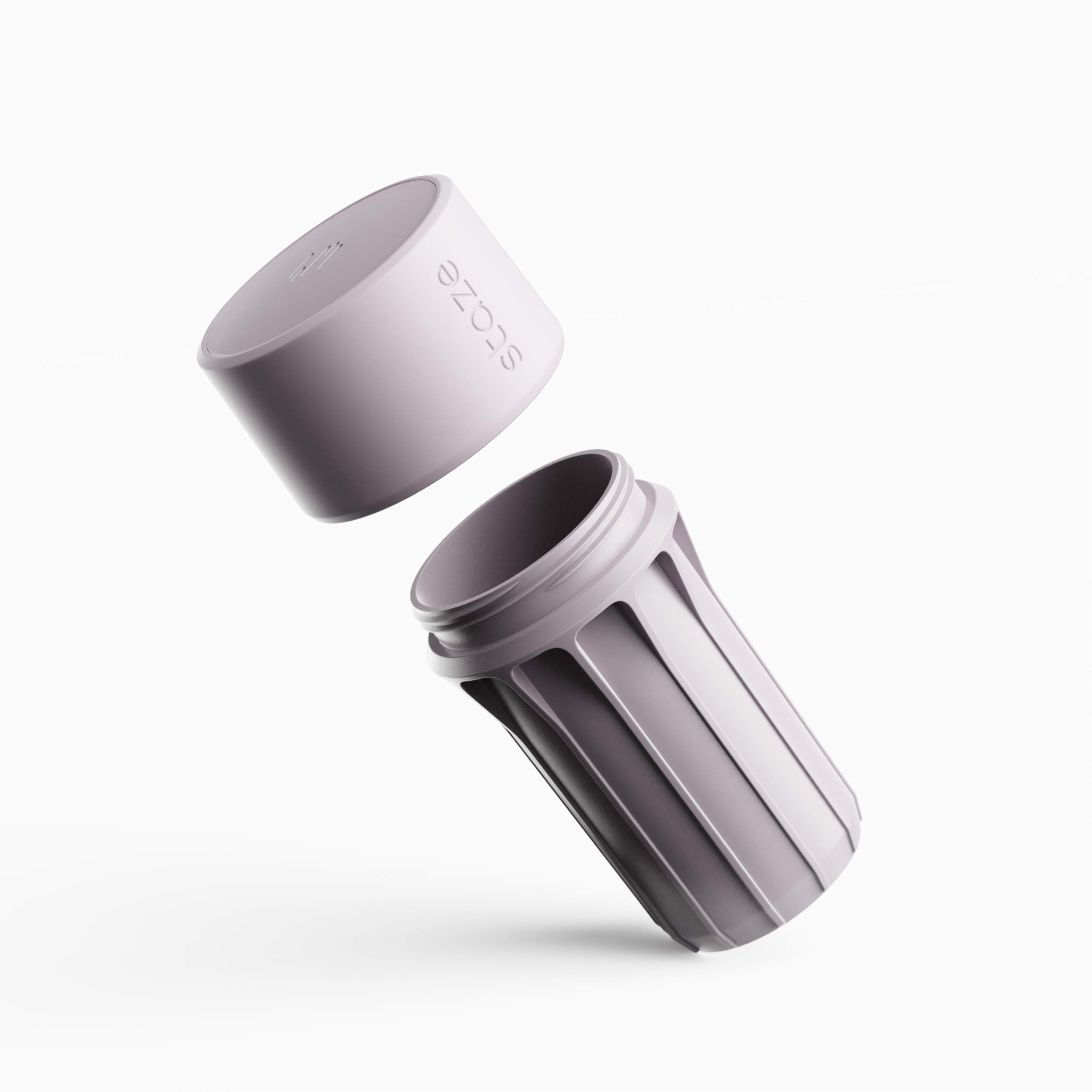 Angled close-up of the pale mauve STAZE PRESERVE cap and threaded body pieces suspended against a white background