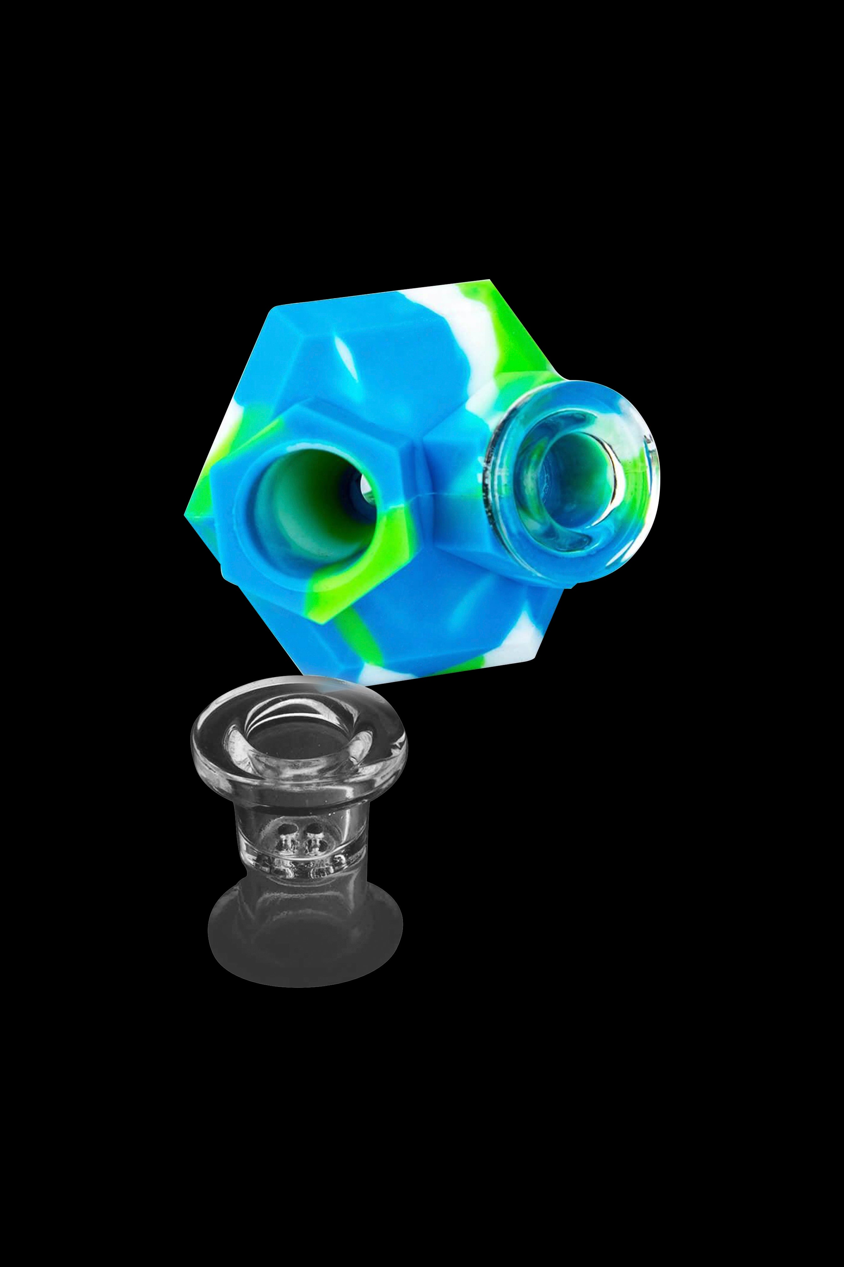 Colorful silicone cap and quartz banger for dabbing cannabis concentrates.