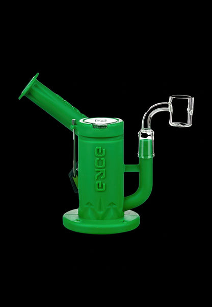Front three-quarter view of the magenta Eyce Solid Color Silicone Sidecar Dab Rig against a black background showing its cylindrical body, angled mouthpiece and clear glass banger.