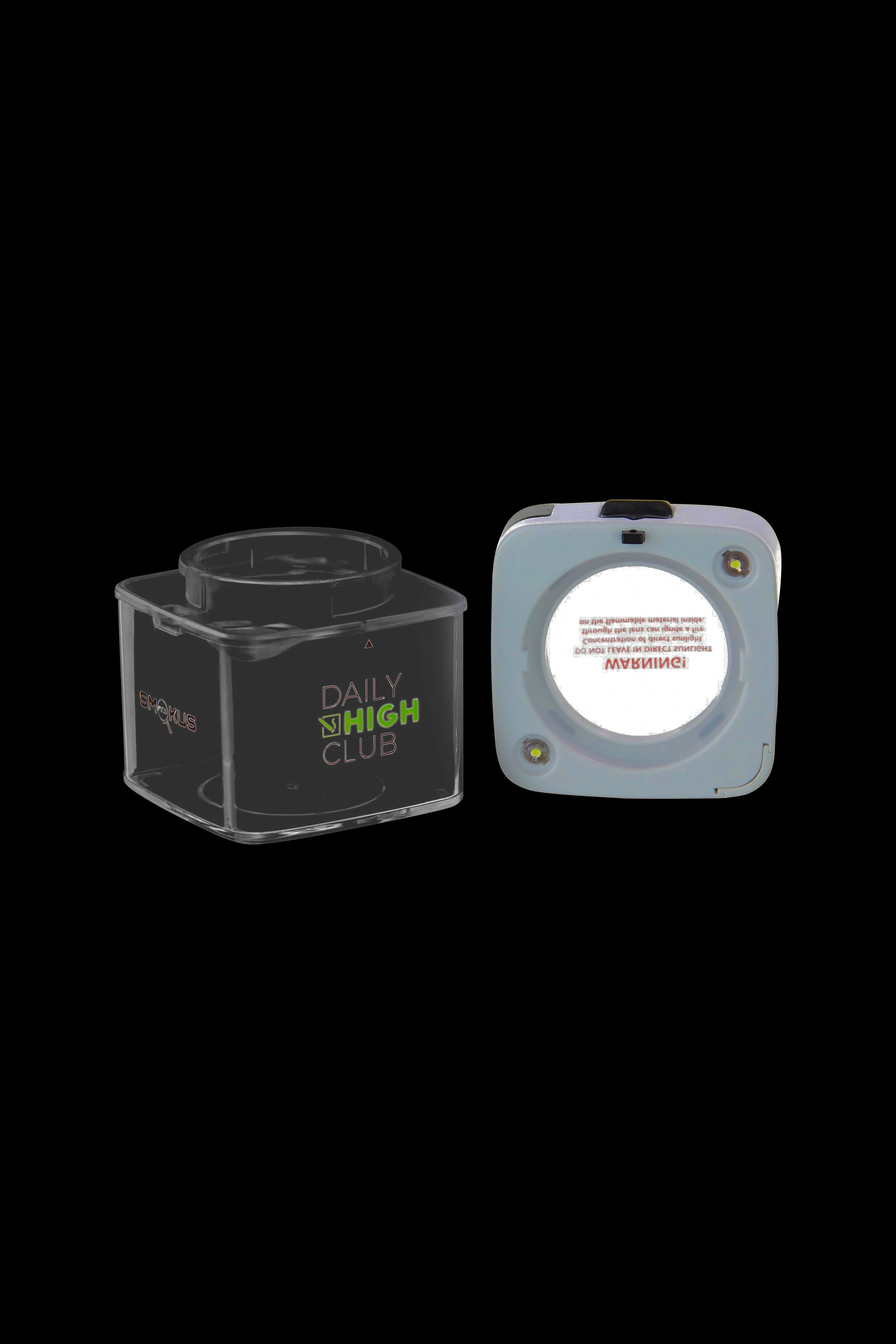 Clear cannabis storage container with “DAILY HIGH CLUB” logo on black background.