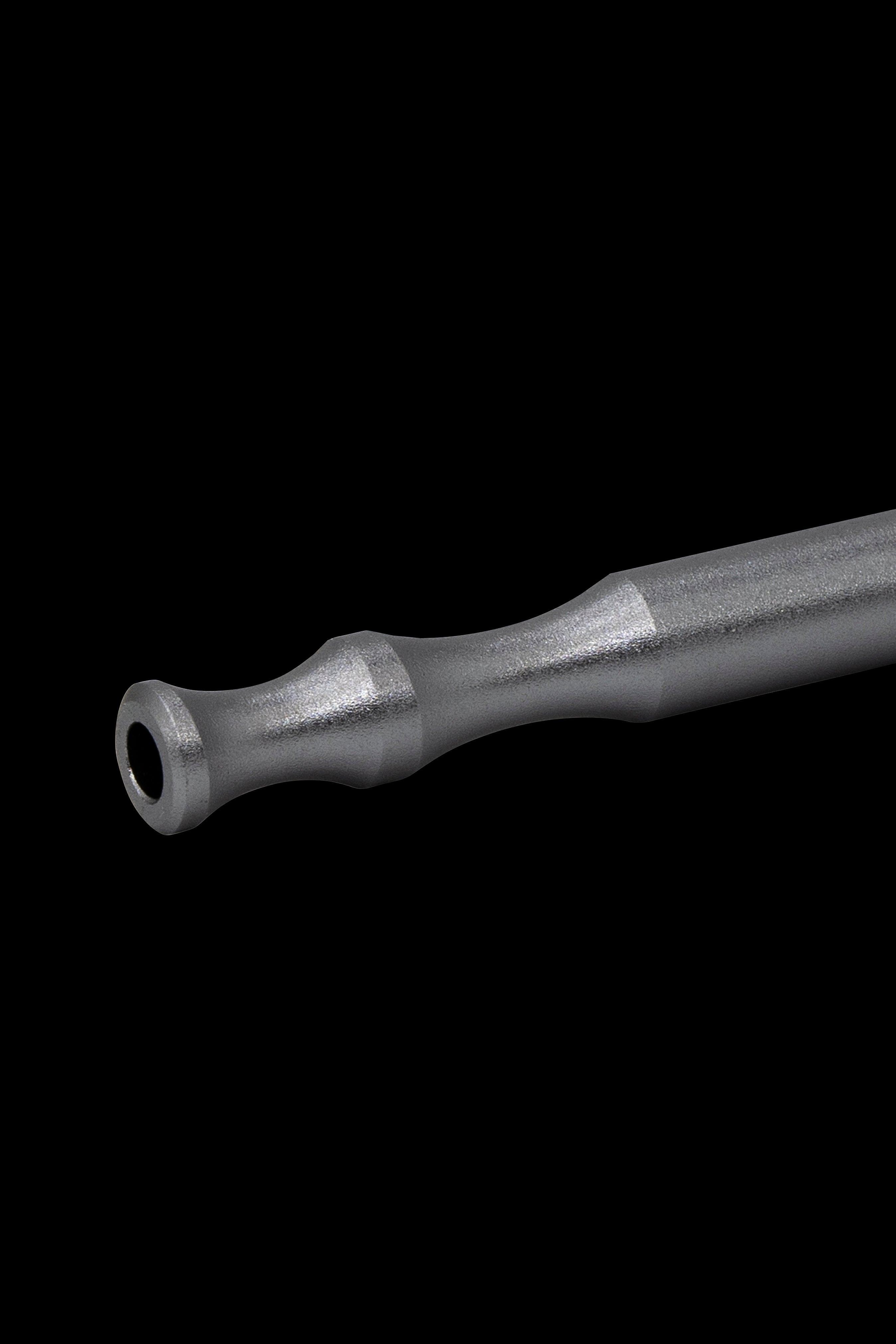 Black titanium dab tool with a rounded tip, isolated on a black background.