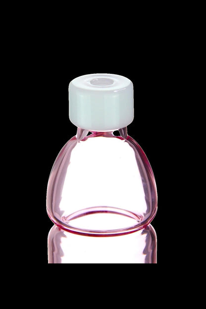 Pink glass concentrate container with white lid.
