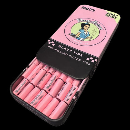 Angled close-up of a pink Blazy Susan Pre Rolled Filter Tips Tin - 100ct - Display Box with its lid partially open to show neat rows of pink pre-rolled filter tips.