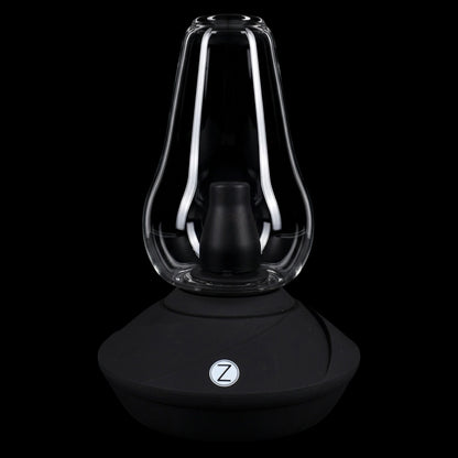 Centered front view of the Zenco Uno Desktop Vaporizer showing its clear glass chamber and matte black base against black.