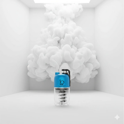 Centered front view of a green Lookah Dragon Egg eRig Bubbler against a white box set, emitting a dense cloud of white vapor behind it.