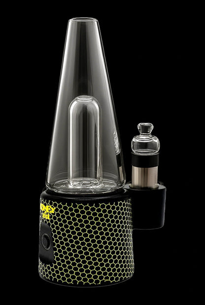 Black and gold electronic dab rig with a glass water pipe attachment.