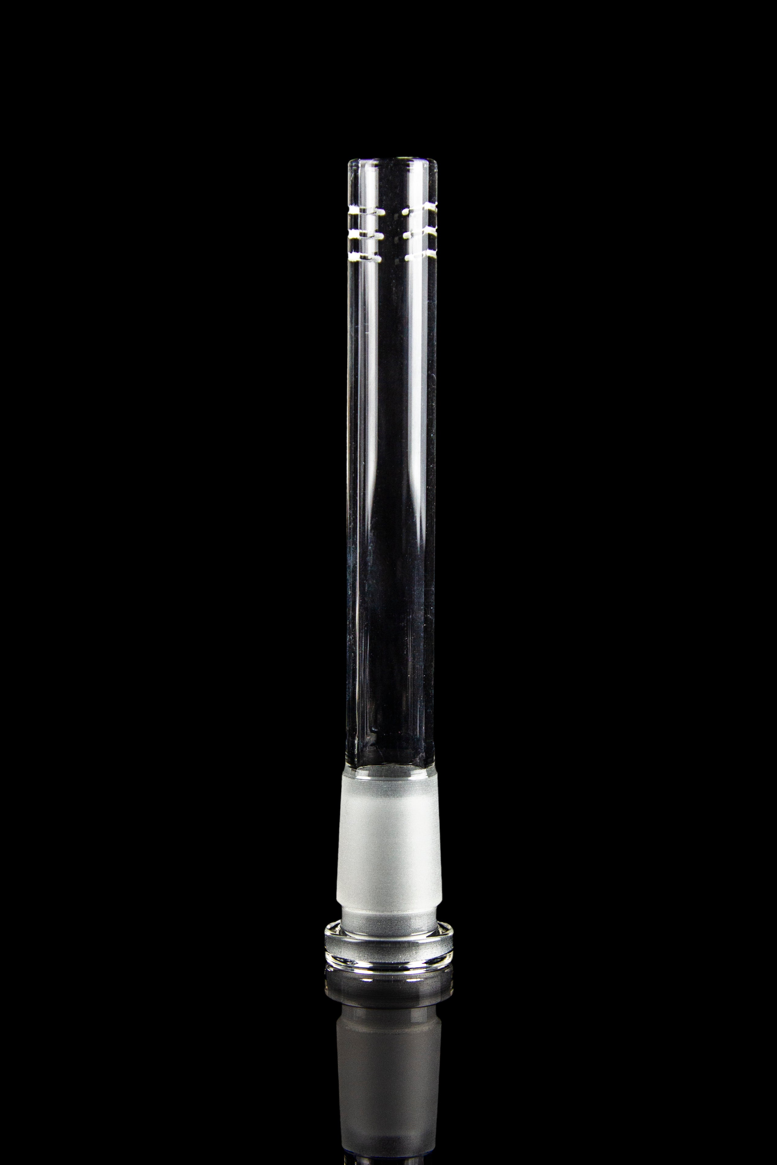Clear glass bong downstem with ice catch, isolated on black.
