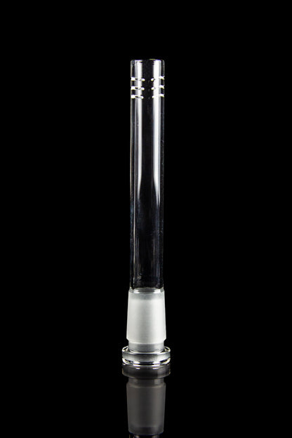 Clear glass bong downstem with ice catch, isolated on black.