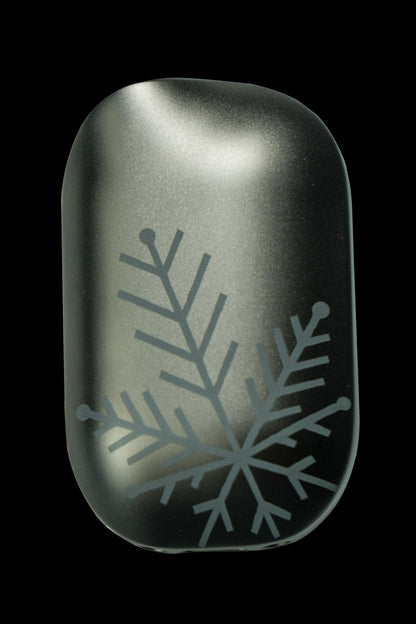 Emerald green cannabis vape pen with etched snowflake design.