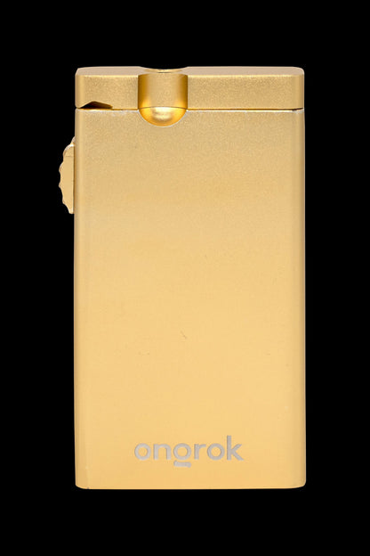 Gold cannabis oil vape pen with “ongrok” logo.
