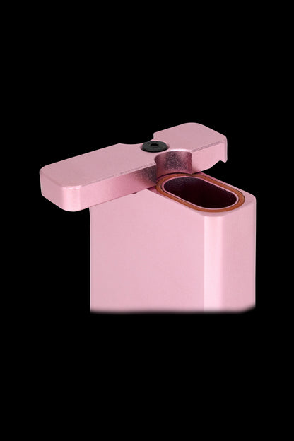 Pink one-hitter pipe with an open end, isolated on a black background.