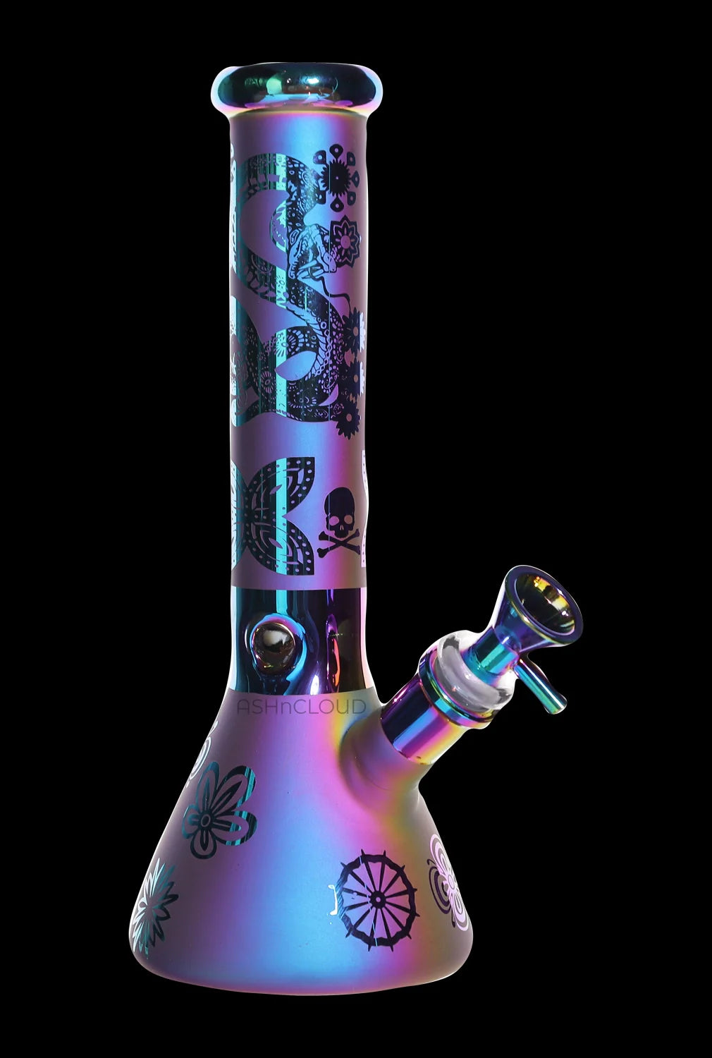 Angled view of the Smoke Cartel Electro Plated Beaker Bong - 10 in. showing its iridescent finish and black floral and skull graphics.