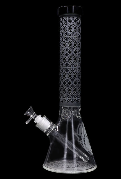 Clear glass bong with intricate frosted geometric patterns and a detachable downstem.