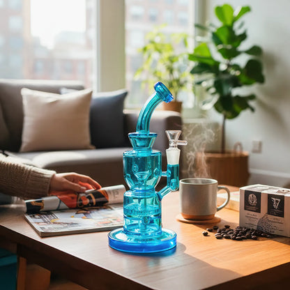 Front view of the Smoke Cartel Neon Bent Neck with Honeycomb Percolator and Thick Base Bong in blue on a sunlit coffee table.
