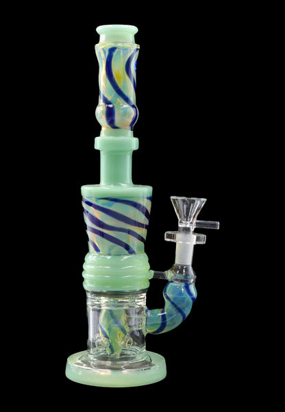 Green glass water pipe (bong) with blue swirls and a glass bowl.