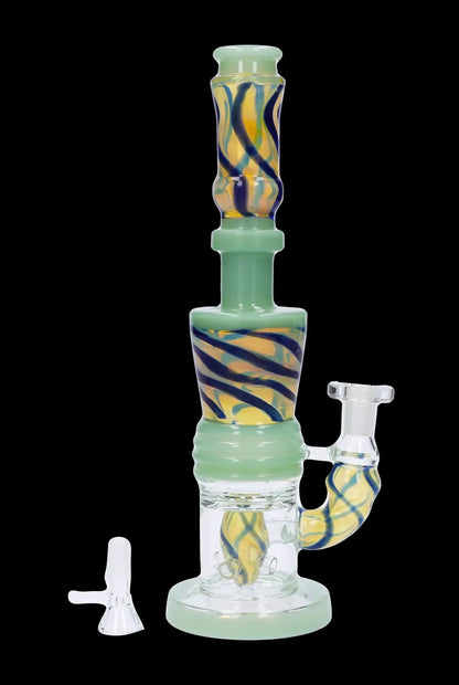 Green glass water pipe with swirling orange and blue accents, and a separate glass bowl.