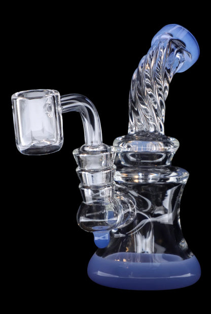 Blue and clear glass dab rig with a quartz banger.