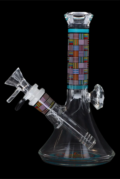 A colorful glass water pipe (bong) with geometric patterns, isolated on a black background.