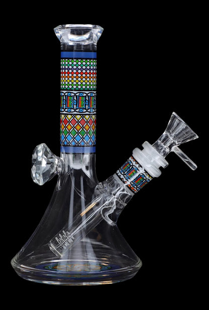 Glass water pipe (bong) with colorful geometric patterns and a clear glass bowl.