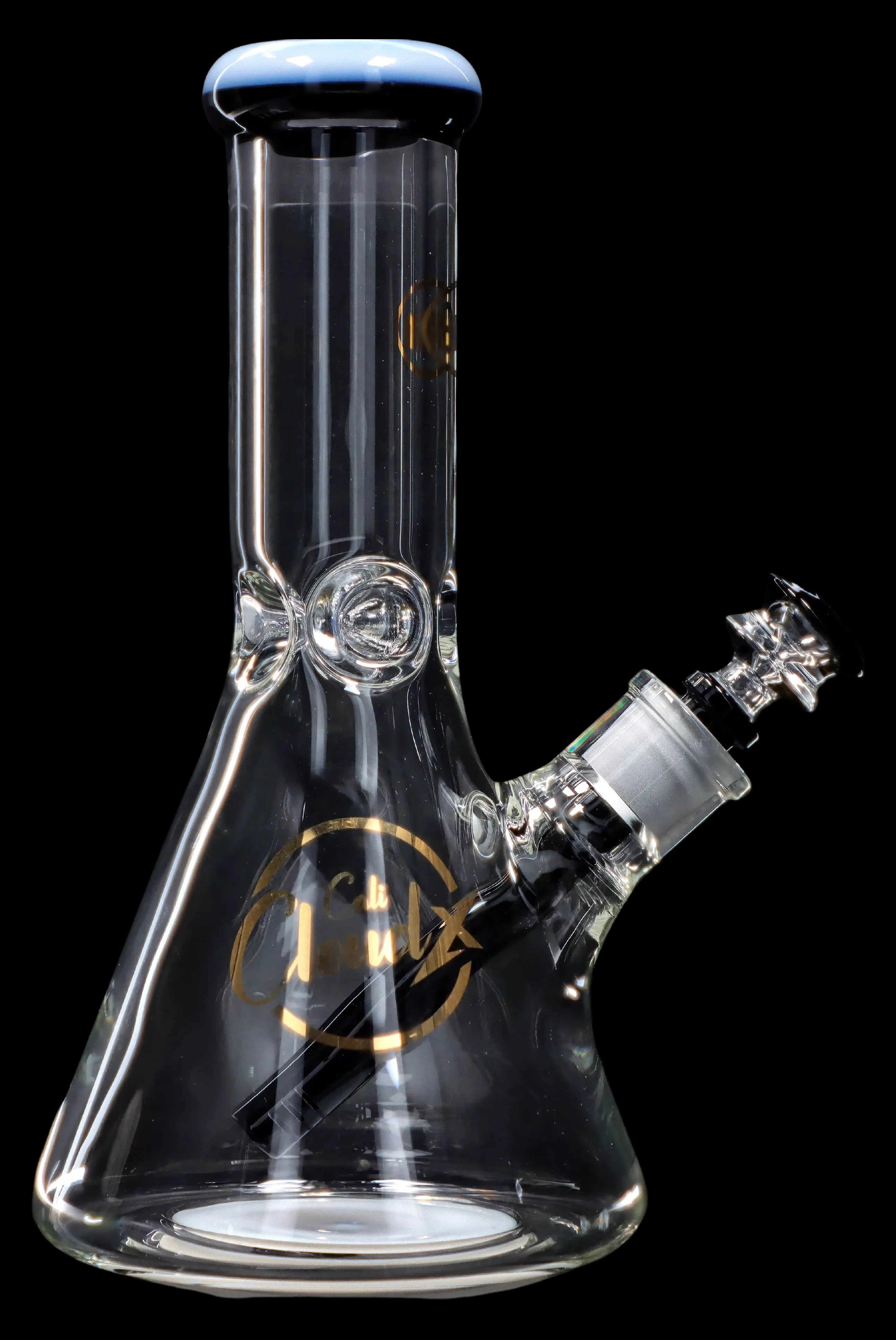 Clear glass water pipe (bong) with ice catcher and patterned detailing, against a black background.