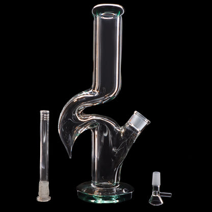 A clear glass water pipe (bong) with a complex percolator design, accompanied by a glass downstem and bowl, isolated on a black background.