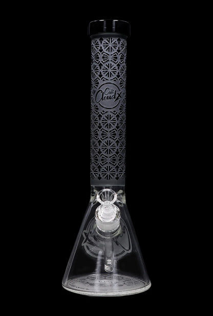 Black glass bong with intricate etched design and clear glass downstem.