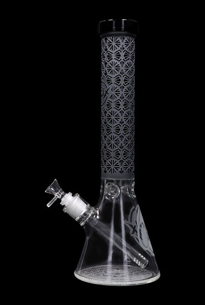 Tall glass bong with intricate geometric patterns and a removable downstem.