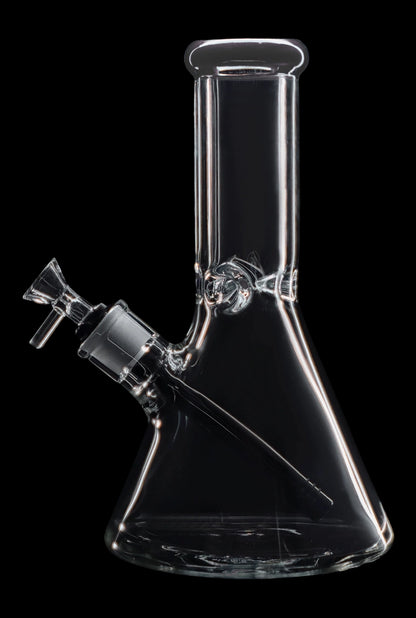 Clear glass bong isolated on a black background.