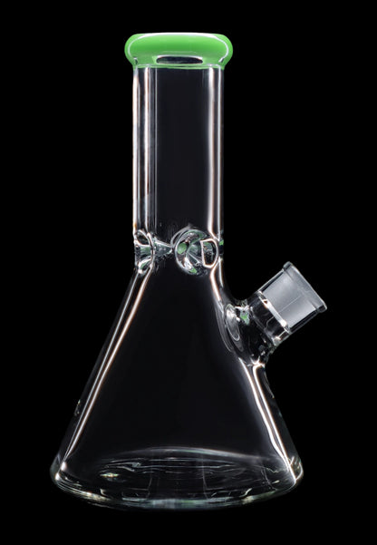 Clear glass bong with green accents against a black background.