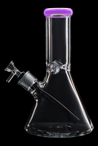 Glass water pipe (bong) with a purple mouthpiece and ice catcher, isolated on a black background.