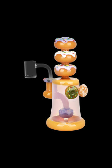 Hand-blown glass dab rig shaped like stacked donuts with colorful internal percolators. - Pulsar Dreamy Donuts Dab Rig
