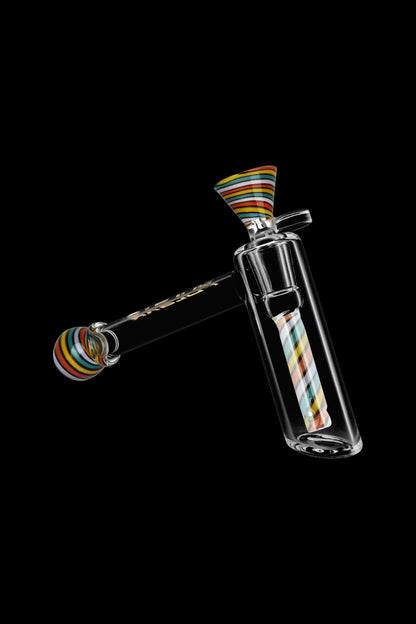 Glass bubbler with colorful accents, isolated on black.