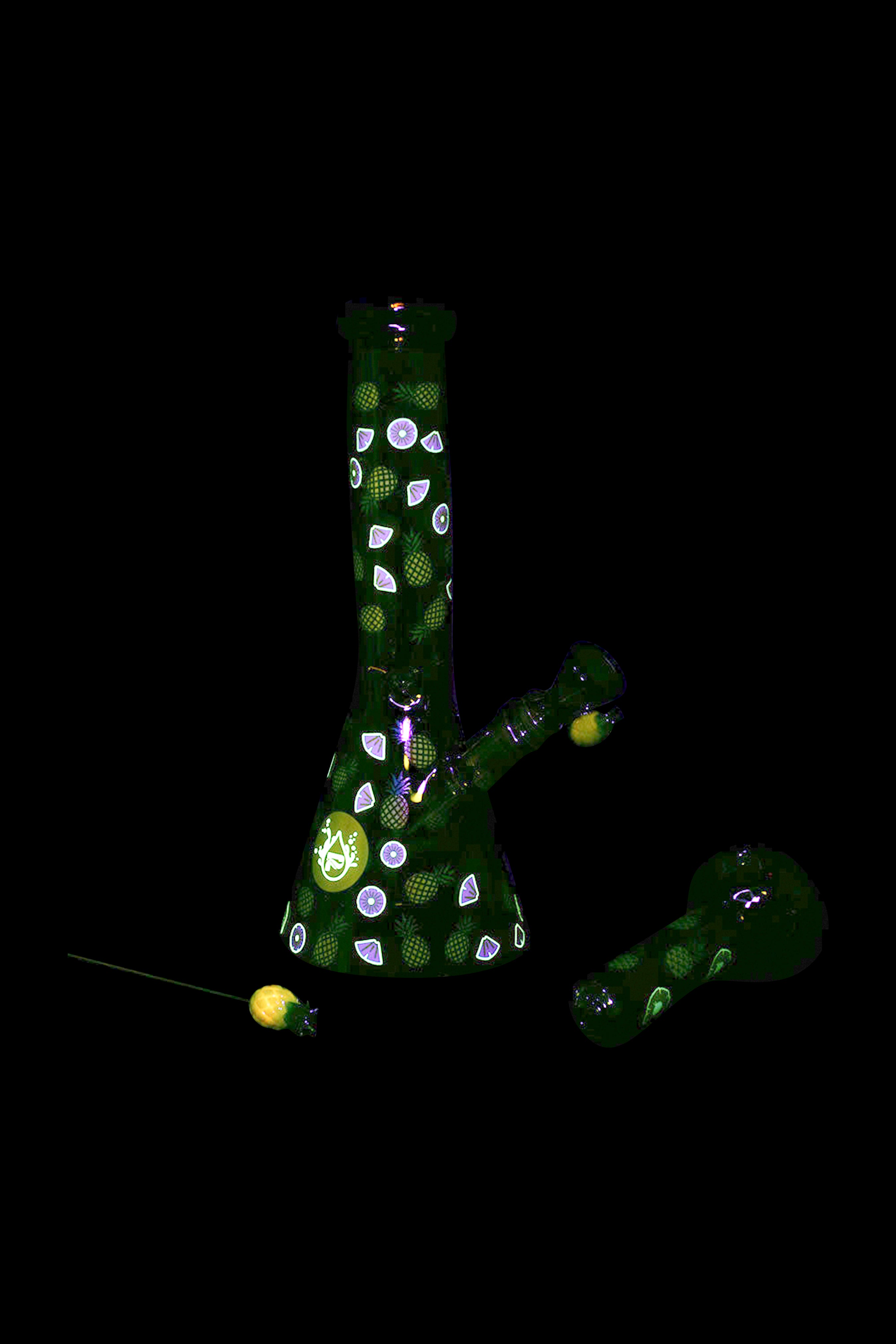Green glass bong with pineapple and leaf patterns against a black background.