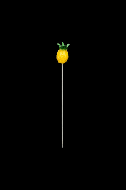 Yellow glass pineapple dab tool with a metal rod.