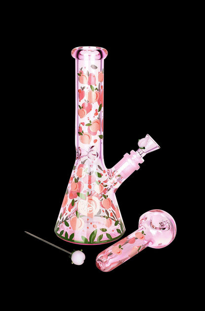 Pink glass bong with peach design and accompanying bowl piece.