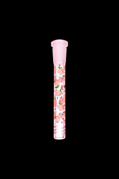 Pink glass cannabis pipe with a peach floral pattern, isolated on a black background.
