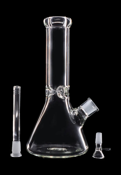 Clear glass bong with downstem and bowl, isolated on a black background.