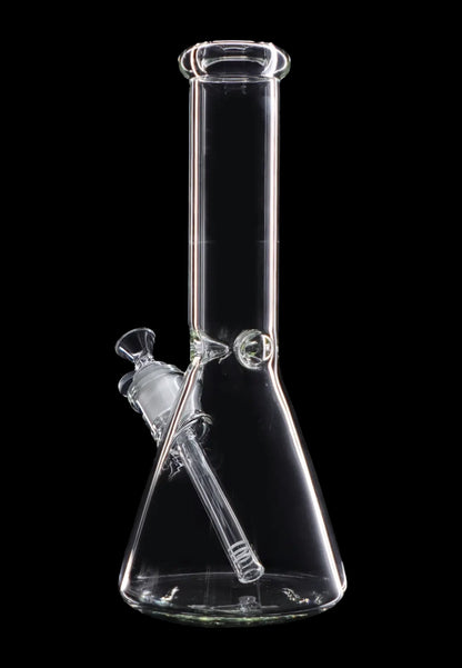 Clear glass bong against a black background.