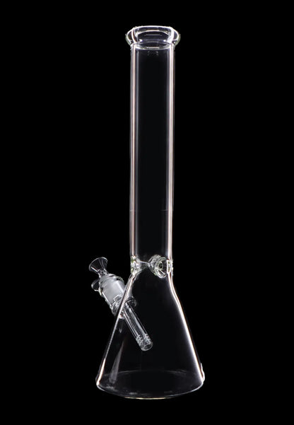 Clear glass bong against a black background.