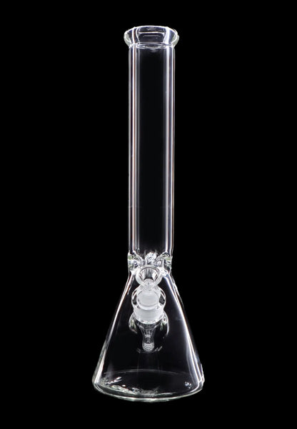 Clear glass bong against a black background.