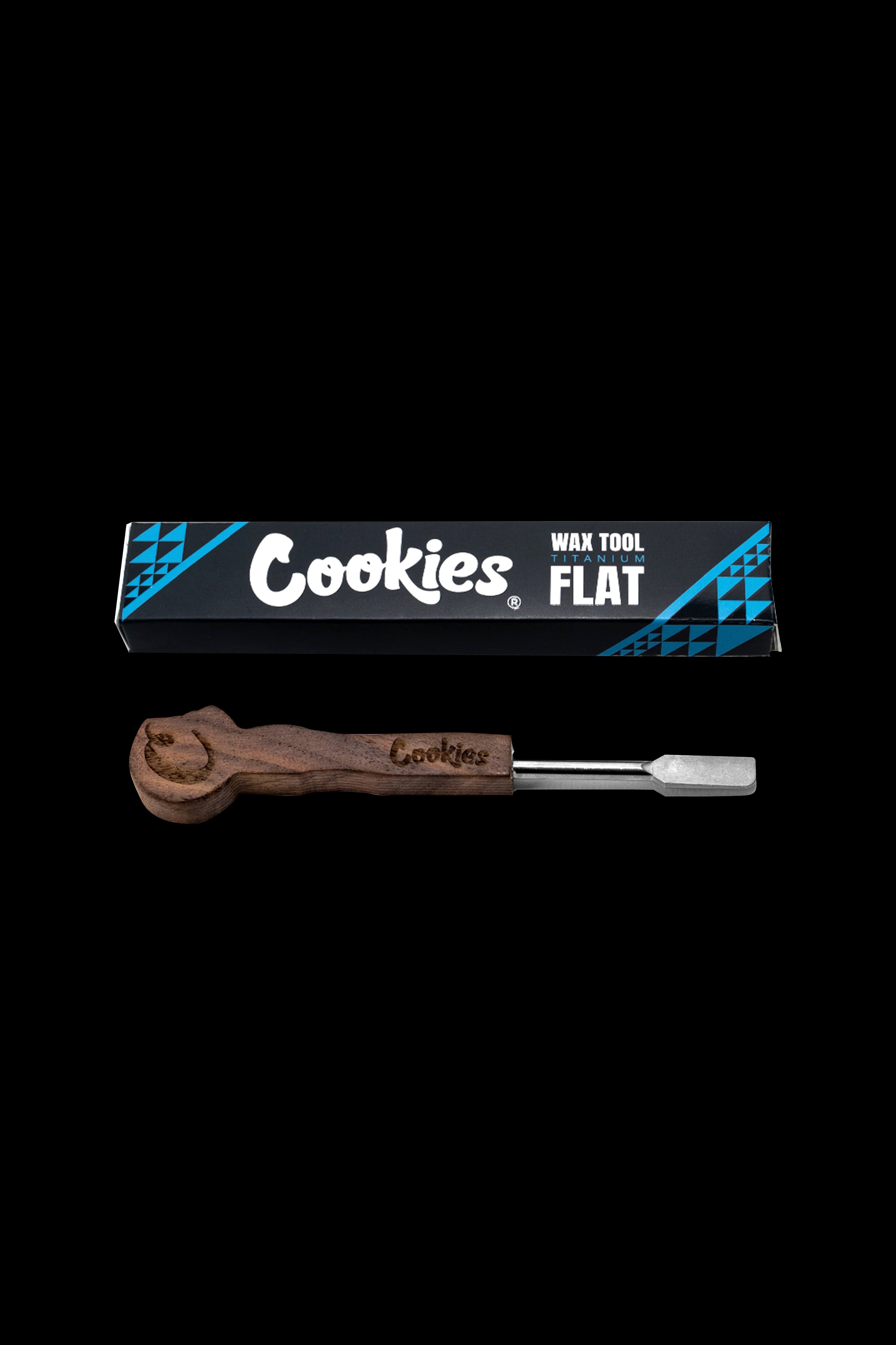 Cookies brand flat titanium wax tool and packaging against a black background.