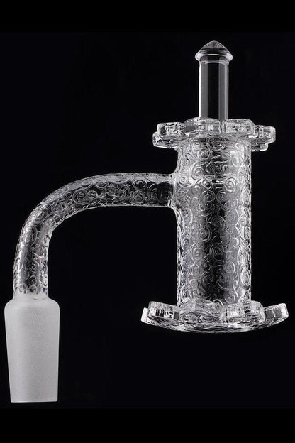 Ornate glass cannabis oil rig attachment.