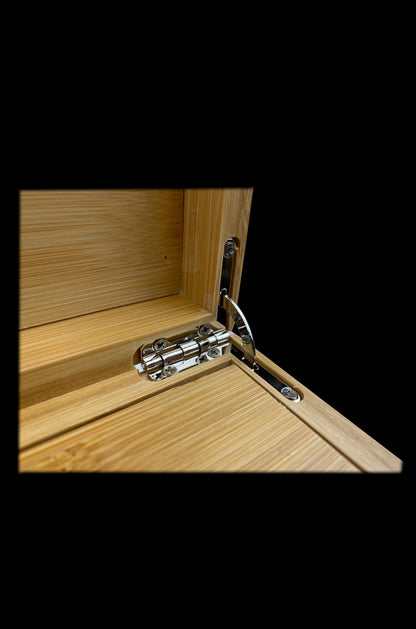 Wooden cannabis storage box with locking latch partially open.
