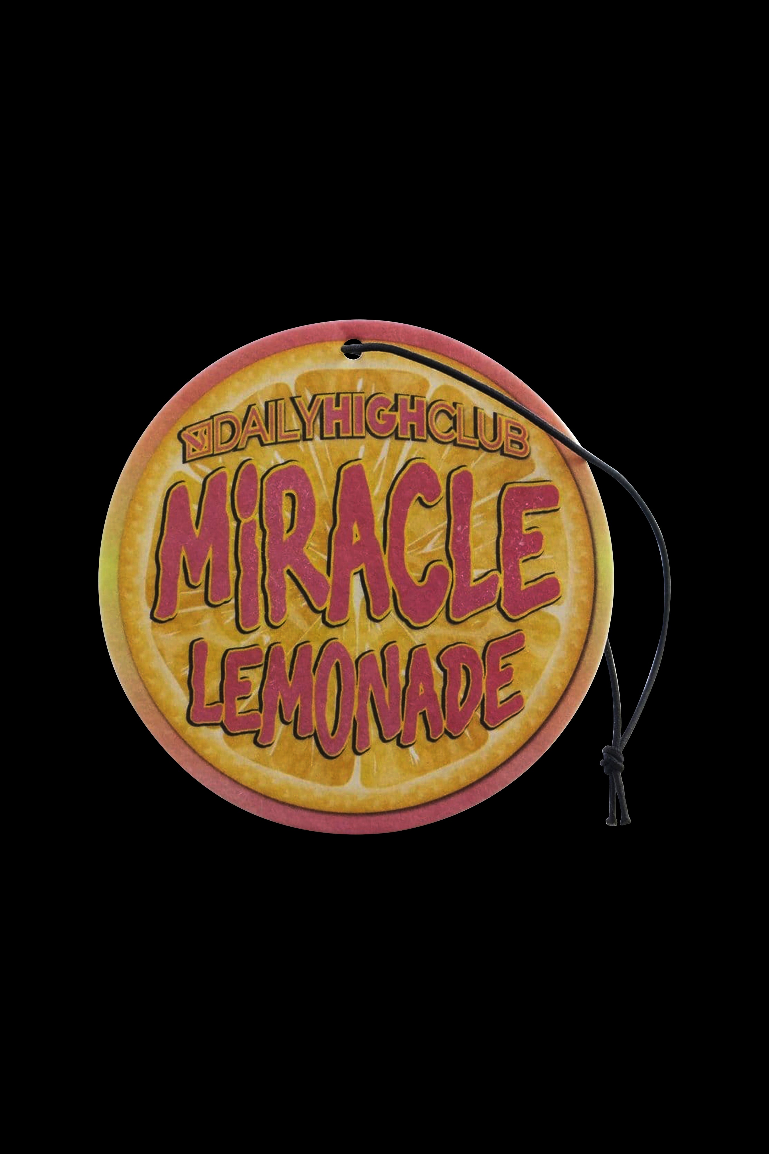 Air freshener shaped like a lemon slice with “Daily High Club Miracle Lemonade” text, hanging from a black cord.