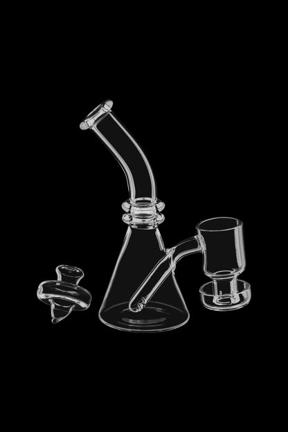 Clear glass rig with attachments on a black background.