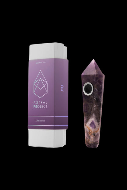Amethyst gemstone pipe and its branded box, featuring a geometric logo and the text “Astral Project.”